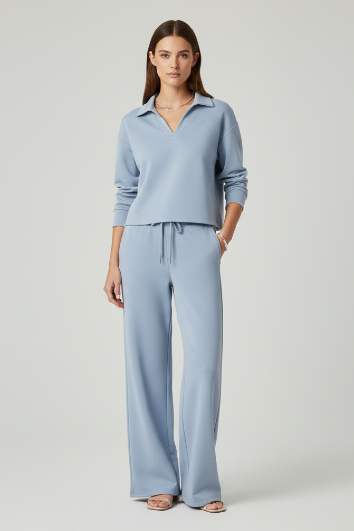 Fashionable women's two-piece set featuring a V-neck top and flowy wide-leg pants, perfect for casual outfits.