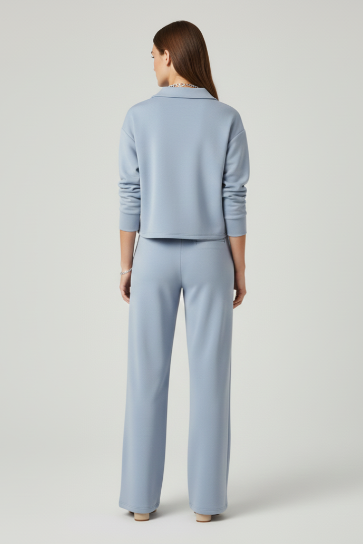Casual yet chic women's set with a V-neck shirt and wide-leg trousers, perfect for effortless style.