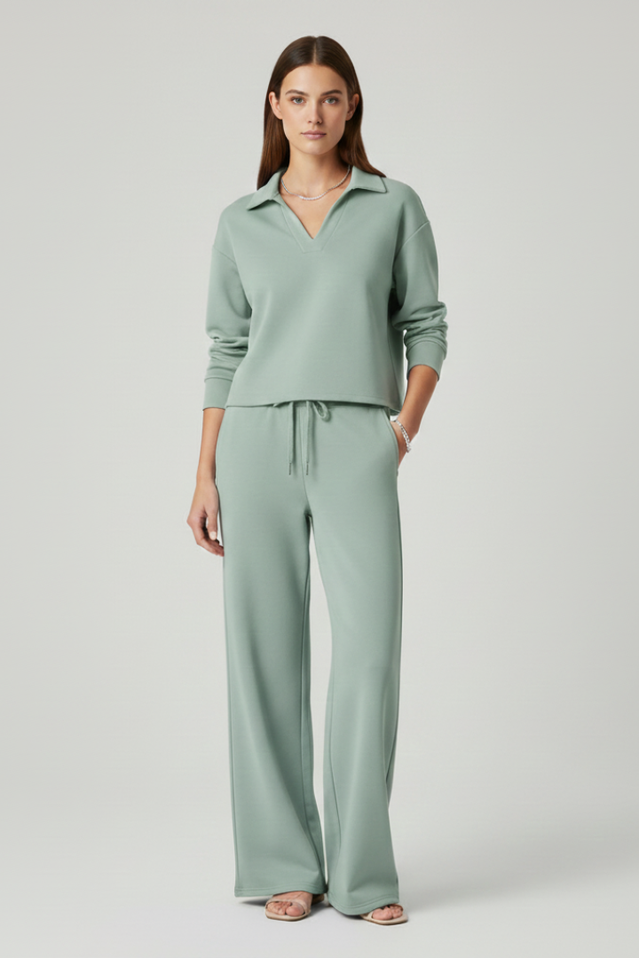 Modern women's two-piece set: a comfortable V-neck top and elegant wide-leg pants for any occasion.