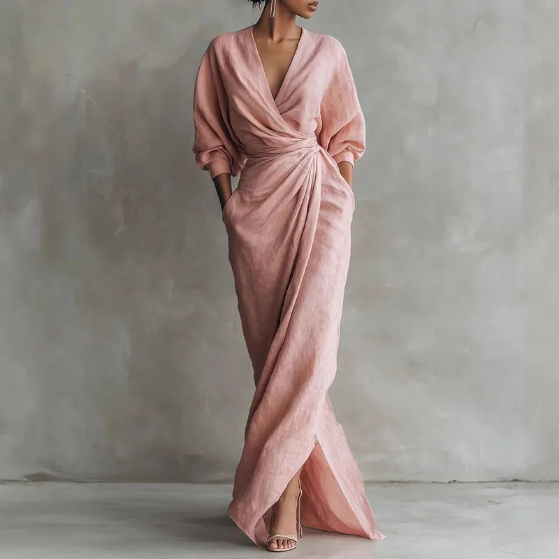 Elegant women's V-neck wrap waist maxi dress in soft pink, perfect for evening or special occasions.