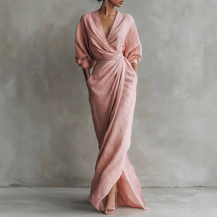 Elegant women's V-neck wrap waist maxi dress in soft pink, perfect for evening or special occasions.
