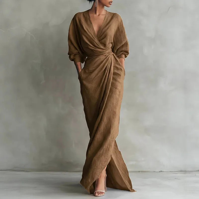 Black V-neck wrap maxi dress, elegant and versatile for women, ideal for casual or evening wear.