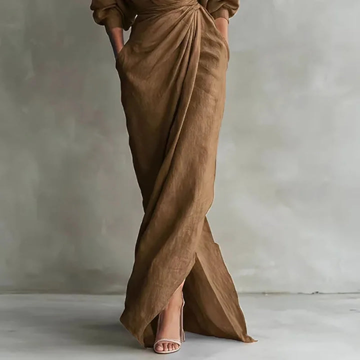 Women's chic V-neck wrap waist bodycon maxi dress with long sleeves, offering an elegant silhouette.