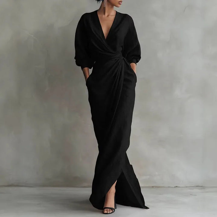 Pretty pink V-neck wrap dress for women, a long sleeve maxi dress with elegant wrap waist detail.