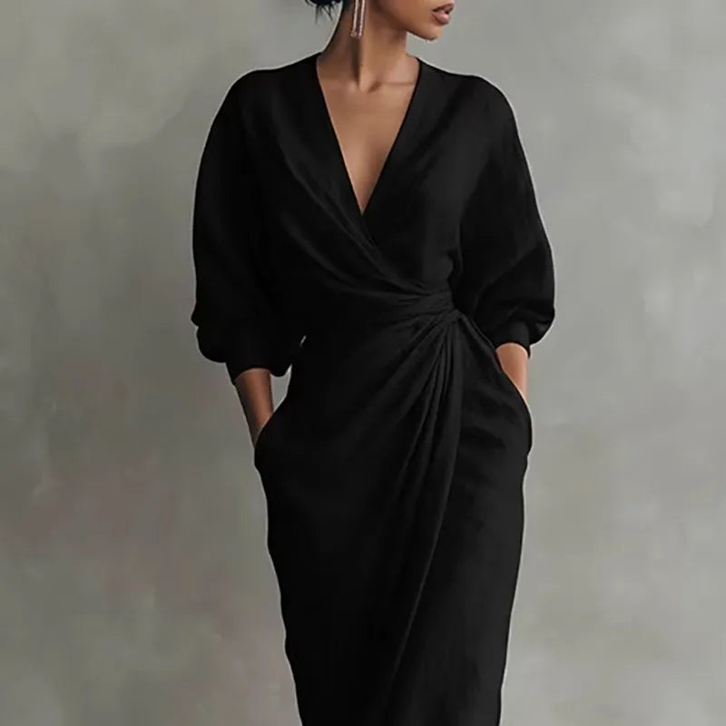 Women's elegant V-neck wrap maxi dress in black, perfect for evening or sophisticated casual style.