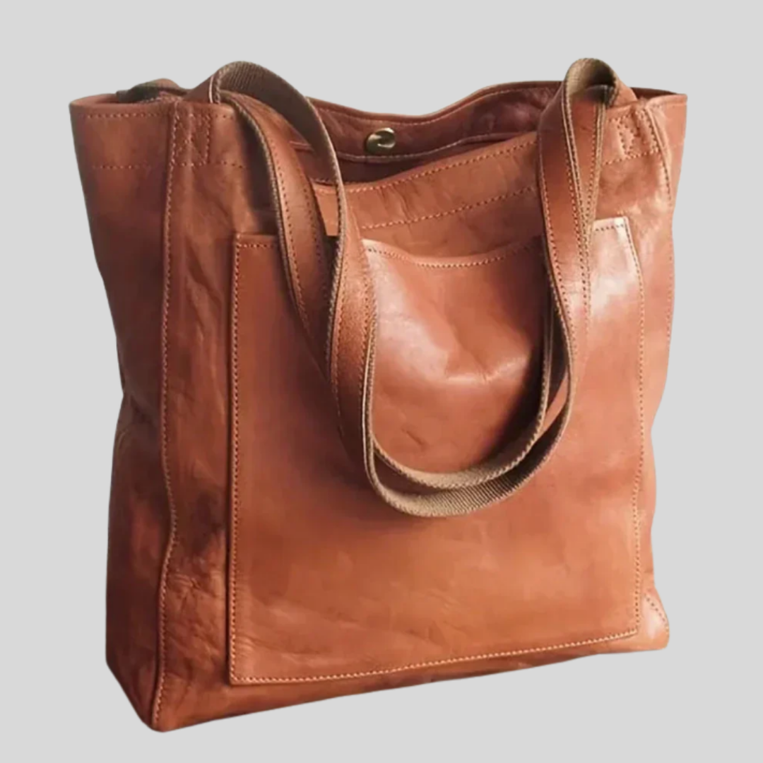 Elegant women's versatile tote bag with shoulder strap, perfect for everyday use & travel. Fashionable accessory.
