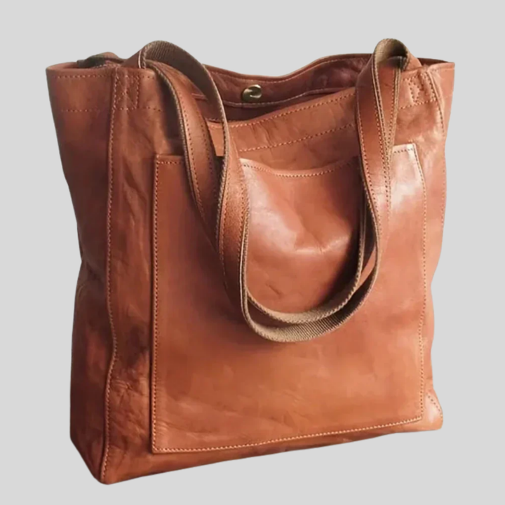 Elegant women's versatile tote bag with shoulder strap, perfect for everyday use & travel. Fashionable accessory.