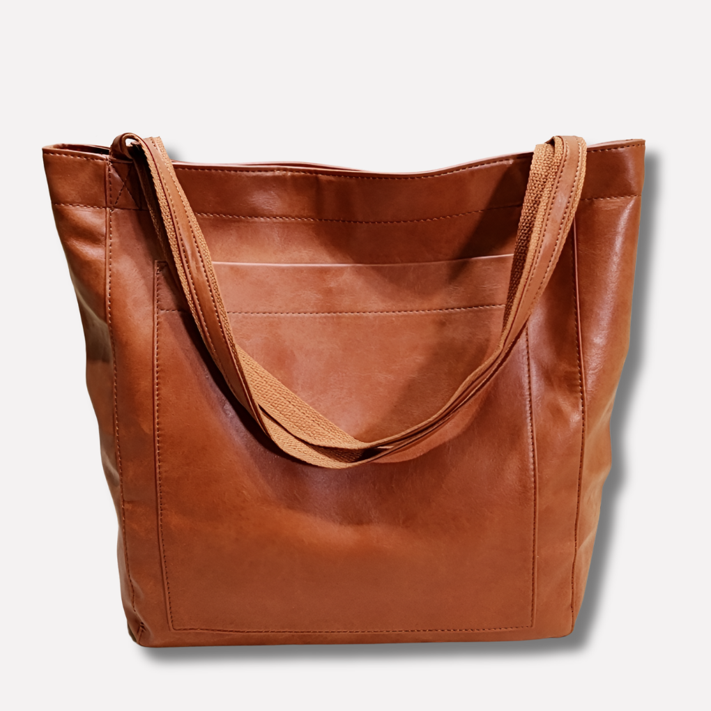 Spacious women's shoulder bag with versatile design, perfect as a handbag or crossbody for daily needs.