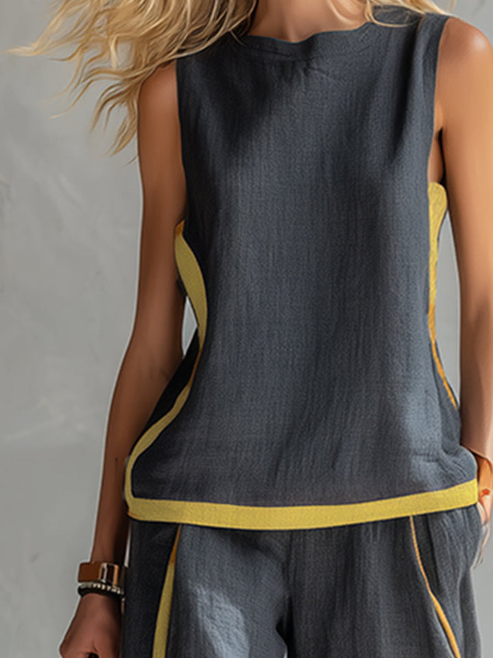 Chic women's sleeveless vest and wide-leg pants matching set. A versatile two-piece ensemble for elegant casual fashion.