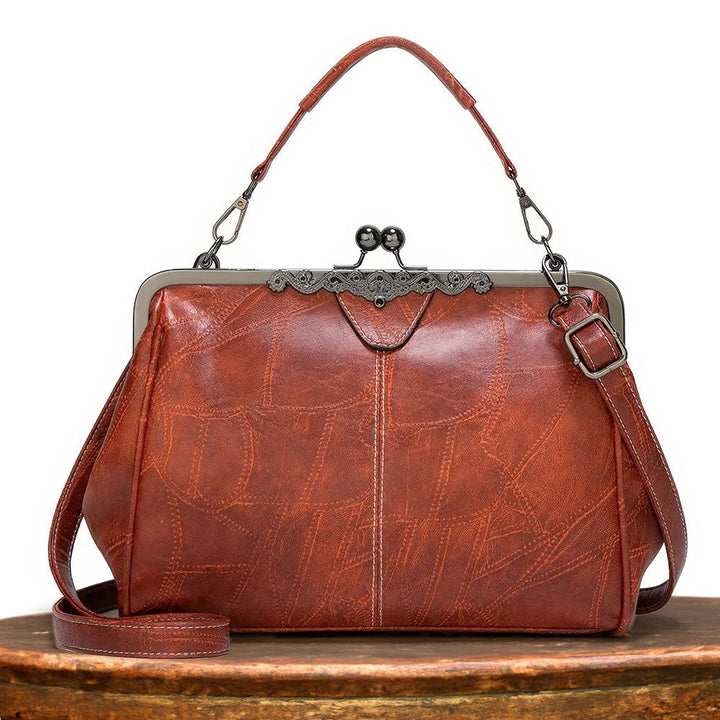 Classic women's leather vintage handbag. Perfect as a shoulder bag or crossbody purse.