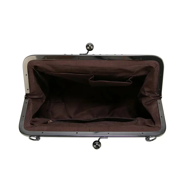 Elegant coffee vintage leather handbag for women. Classic shoulder bag with stylish appeal.