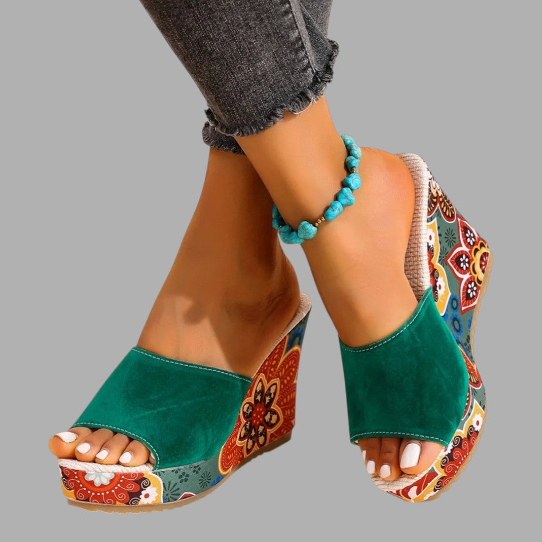 Elegant women's wedge sandals, perfect for summer comfort. Stylish ladies' heeled footwear for any occasion.