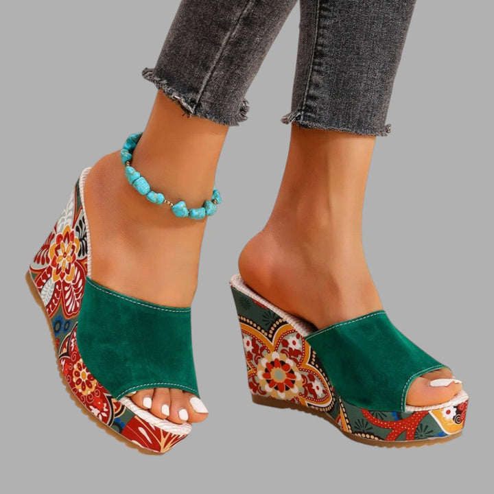 Black stylish wedge sandals for women. Elegant summer evening shoes, offering comfortable heeled support.