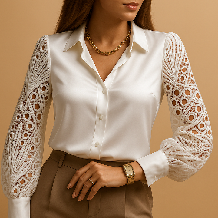 Elegant women's white blouse with delicate lace sleeves, perfect for work or chic evening wear. Classic button-up style.