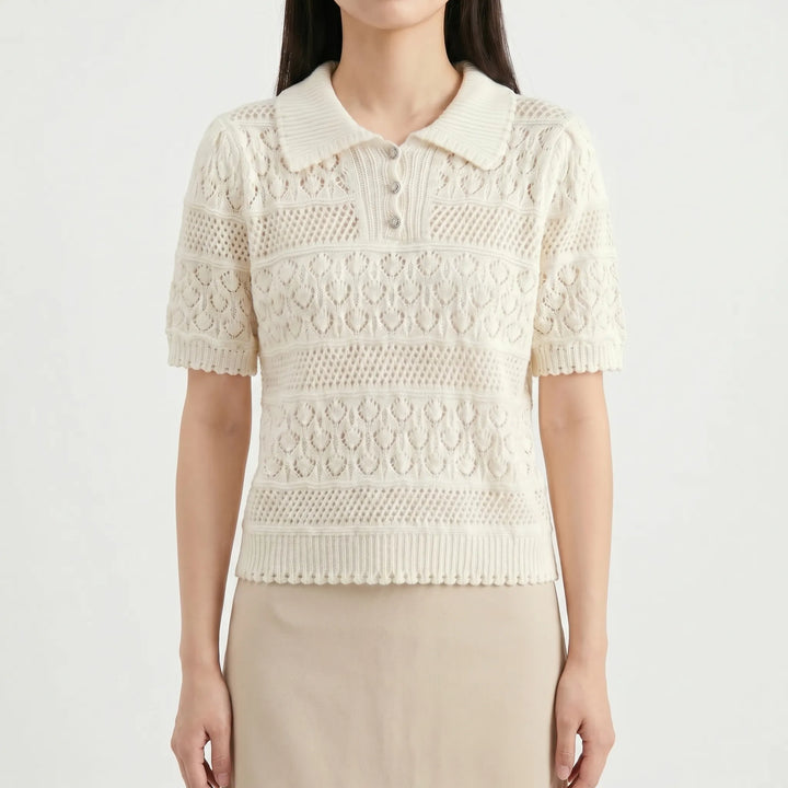 Fashionable women's white knit blouse with crochet detail & short sleeves. An elegant & breathable summer top.