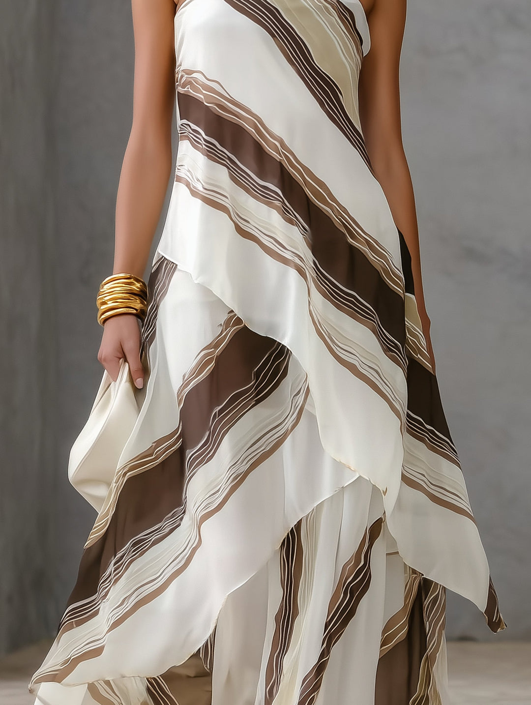 Chic women's white striped strapless maxi dress with a unique asymmetric hem; a stylish choice for resort & evening.