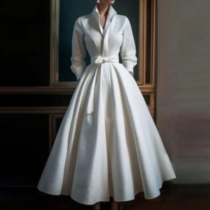 Elegant women's white V-neck A-line midi dress with long sleeves, perfect for formal events or sophisticated parties.