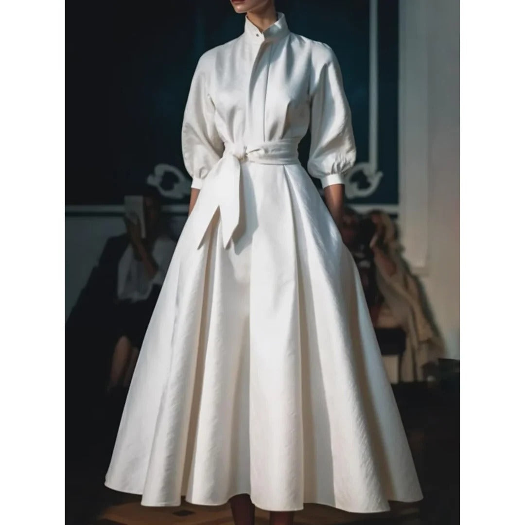Sophisticated women's long sleeve V-neck A-line white midi dress, ideal for elegant occasion wear or summer parties.