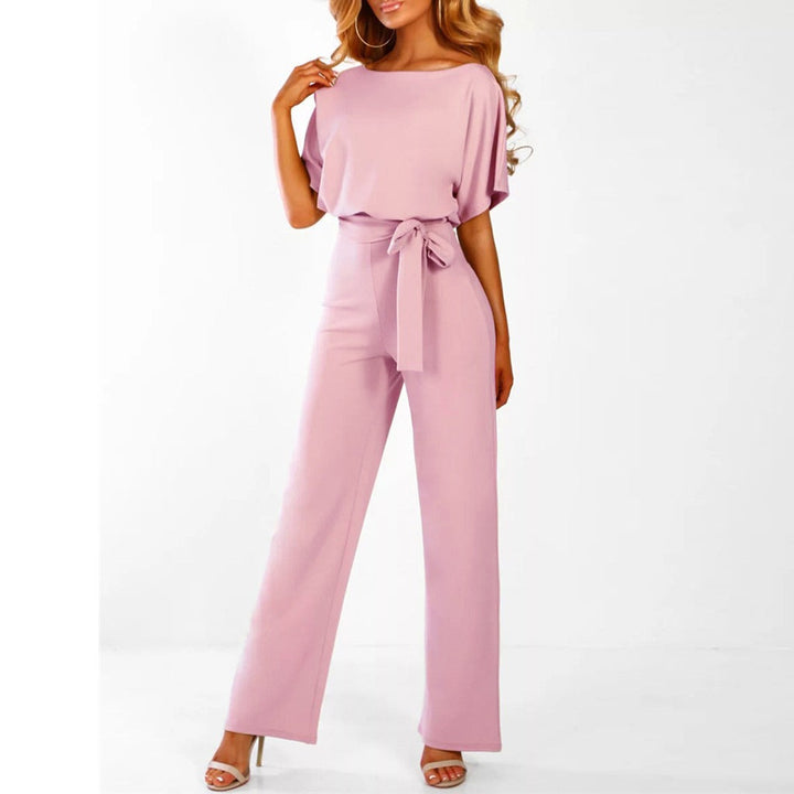 Sophisticated women's wide-leg one-piece jumpsuit with a stylish belted waist. Elegant and comfortable modern apparel.