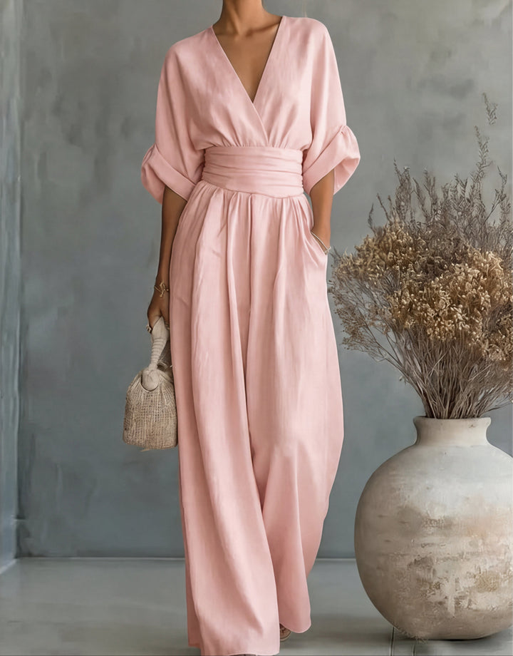 Comfortable wide-leg jumpsuit for women, elegant wrap front. Chic day to night style.