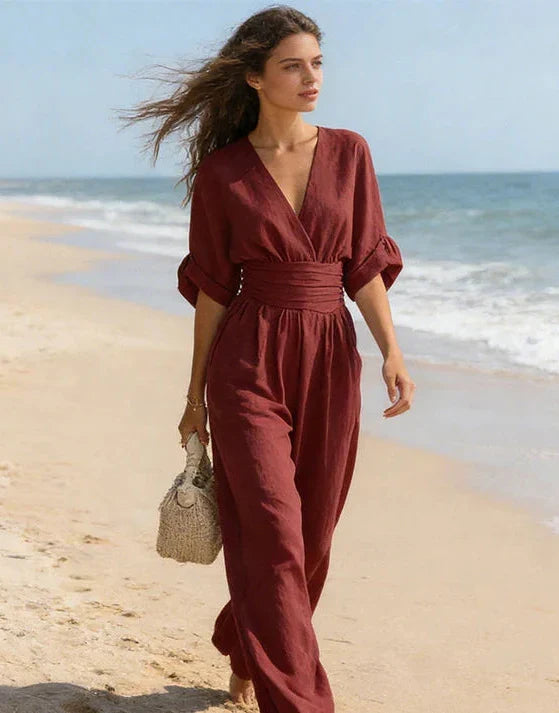 Comfortable women's wide-leg jumpsuit with flattering wrap front. Versatile for any occasion.