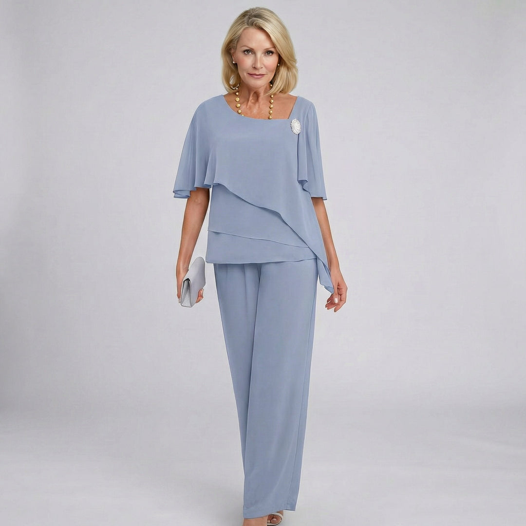 Elegant women's wide-leg pant set with flutter sleeves, perfect for formal events, weddings, or evening wear.