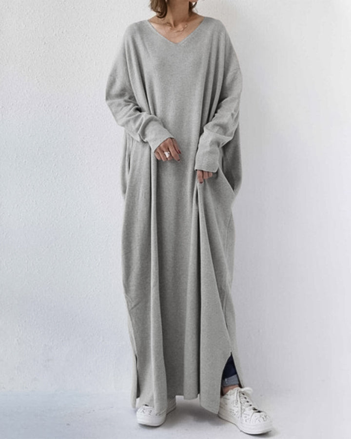 Elegant women's winter maxi dress with long sleeves. Flowing design, perfect for cold weather evenings or casual comfort.
