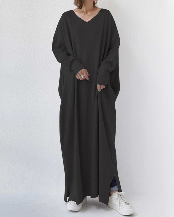 Comfortable long sleeve maxi dress for women. Flowing elegant design, ideal for modest winter fashion.