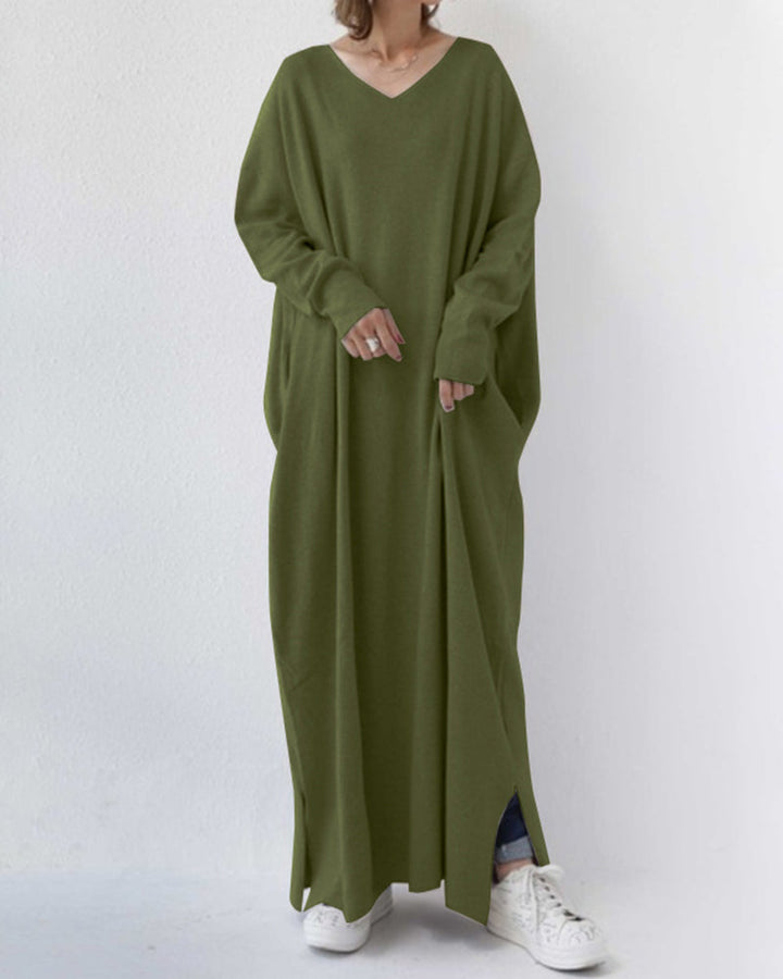 Flowing long sleeve elegant maxi dress for women. Ideal for winter evenings, offering warmth and sophisticated style.