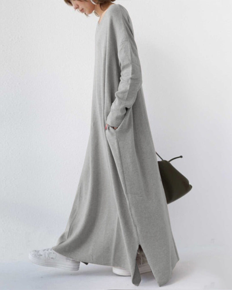 Plus size elegant winter maxi dress for women. Flowing long sleeves, versatile for cold weather casual or evening wear.