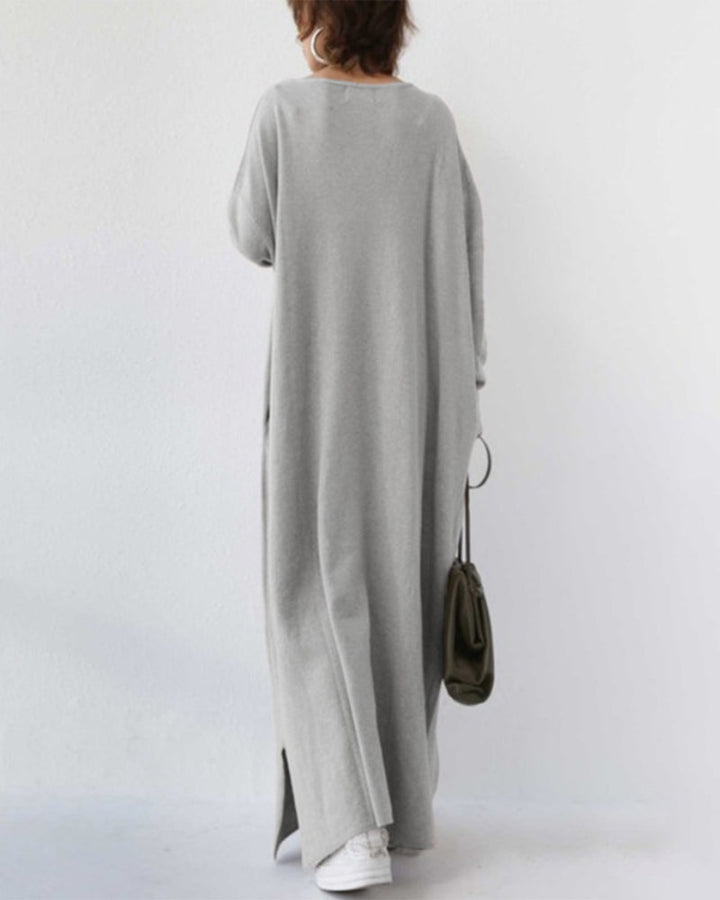 Women's elegant winter maxi dress. Flowing long sleeve design offers comfort and style for any cold weather occasion.