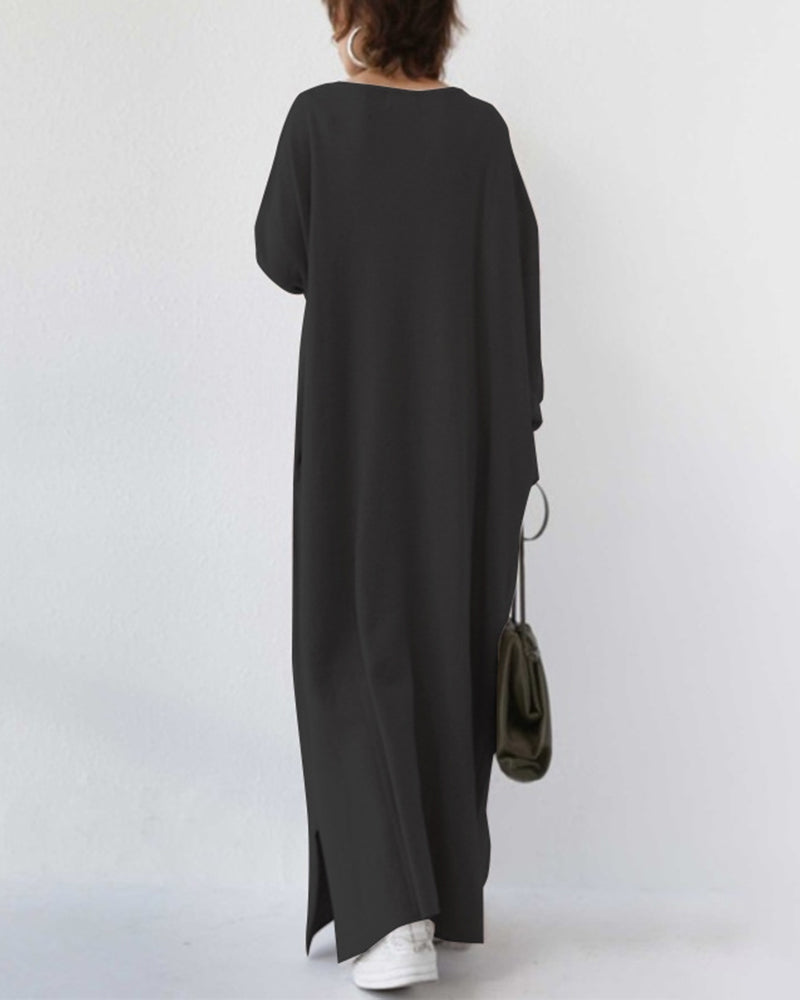 Long sleeve women's maxi dress. Elegant and flowing, this winter dress provides warmth and modest fashion for cold days.