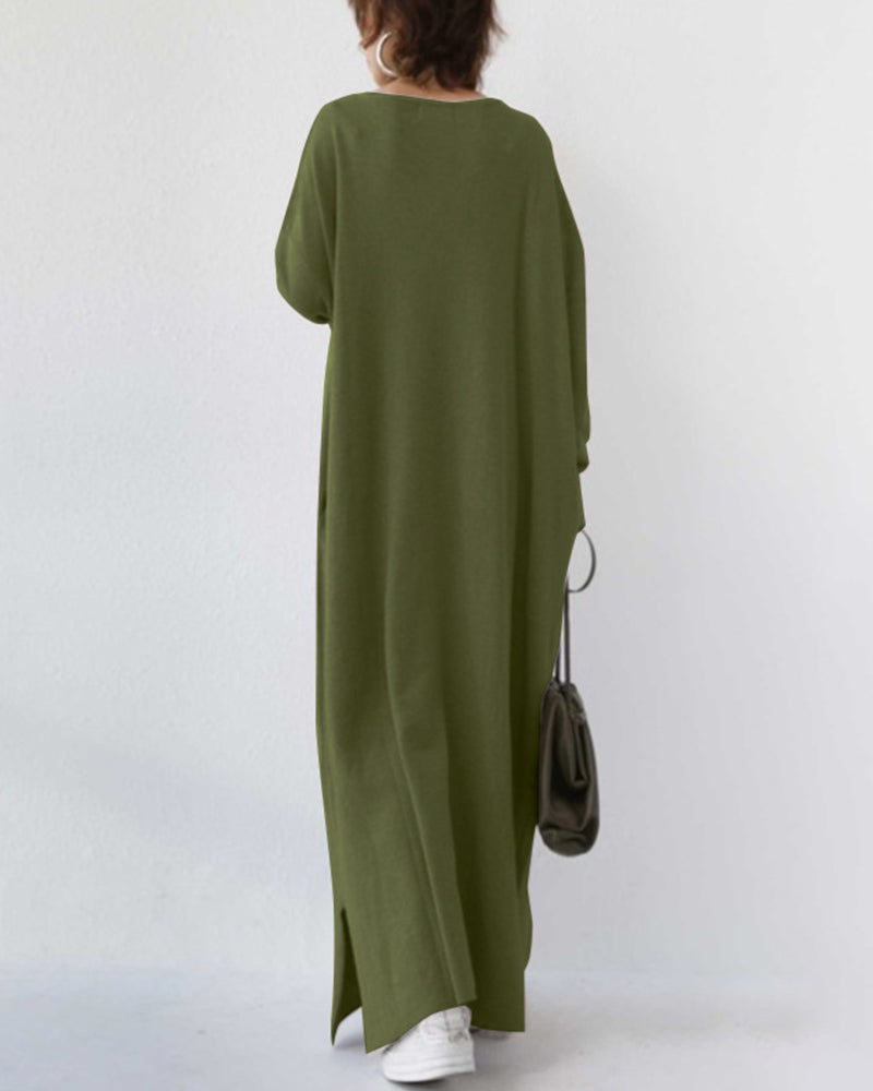 Elegant flowing long sleeve maxi dress for women. Perfect winter essential for comfortable and stylish cold weather looks.