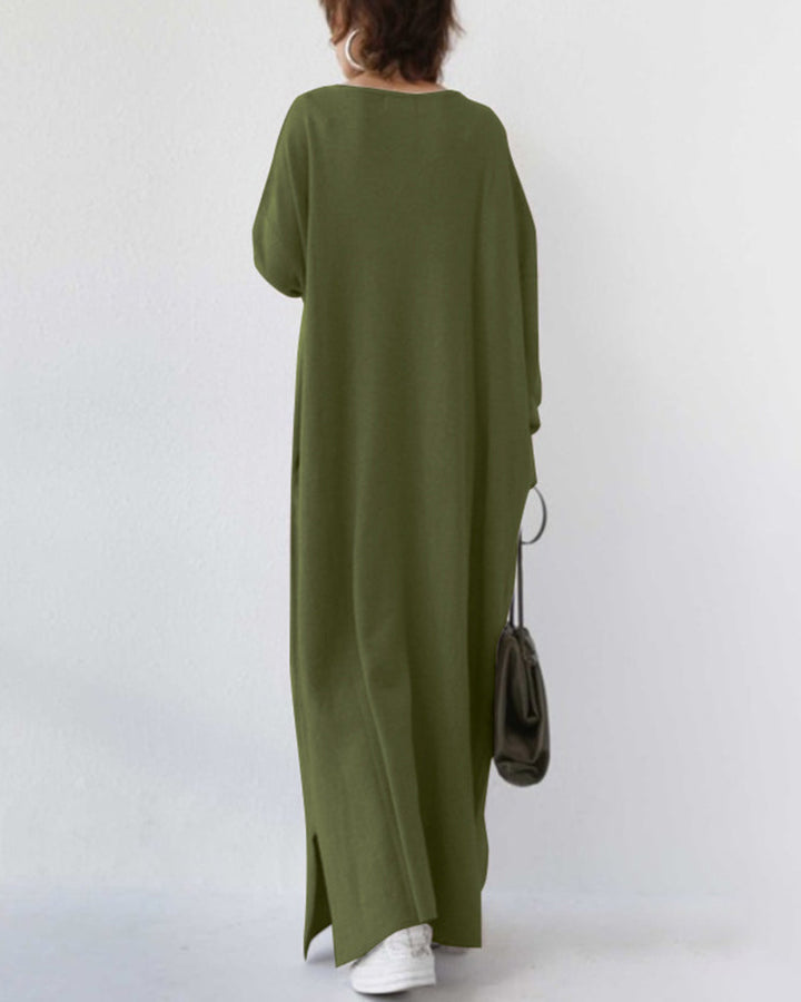 Elegant flowing long sleeve maxi dress for women. Perfect winter essential for comfortable and stylish cold weather looks.