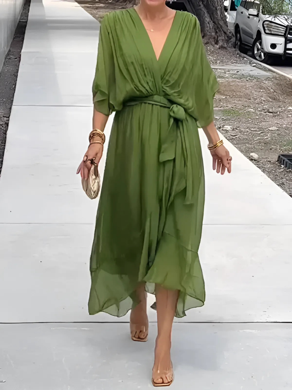 Elegant women's wrap midi dress. Flattering V-neck & flowy skirt, perfect for spring/summer events.