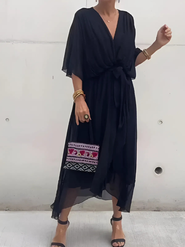 Classic women's elegant midi wrap dress. Comfortable, versatile, and perfect for work or leisure.