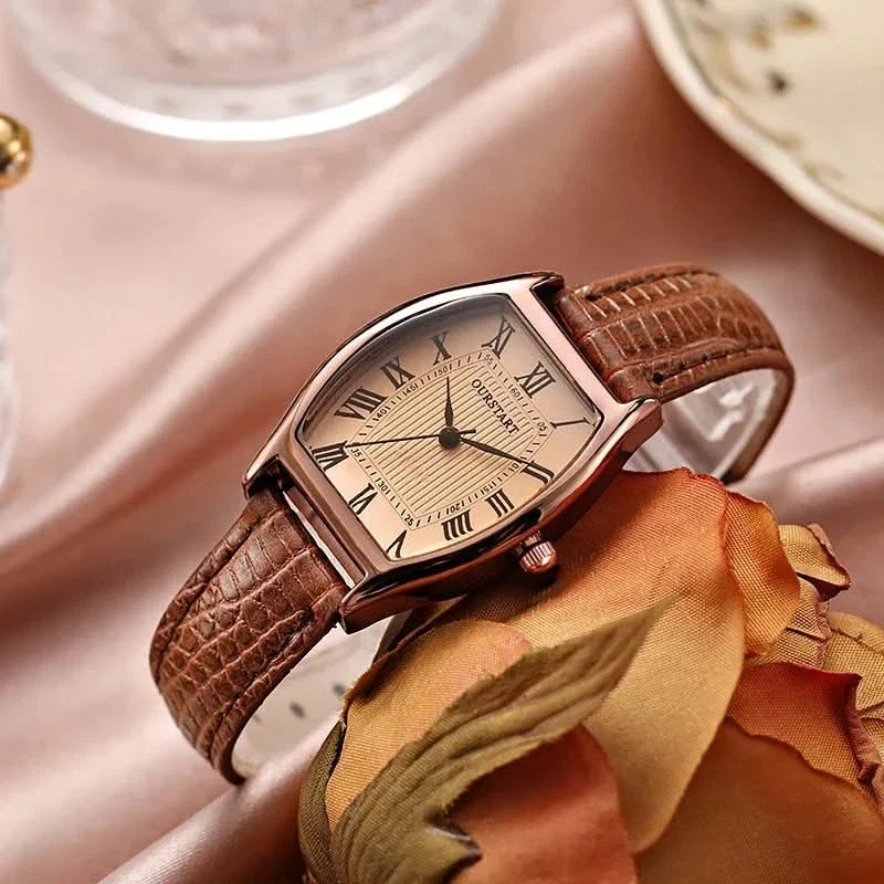 Stylish women's green wristwatch with elegant Roman numerals and an analog display; perfect classic fashion accessory.