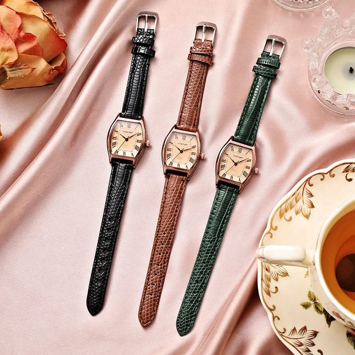 Black women's elegant wristwatch with Roman numerals, analog display, and adjustable band for a sophisticated look.