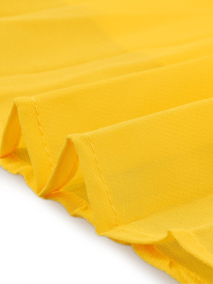 Stunning yellow women's swing dress with elegant pleats, mock neck, and stylish cape sleeves.