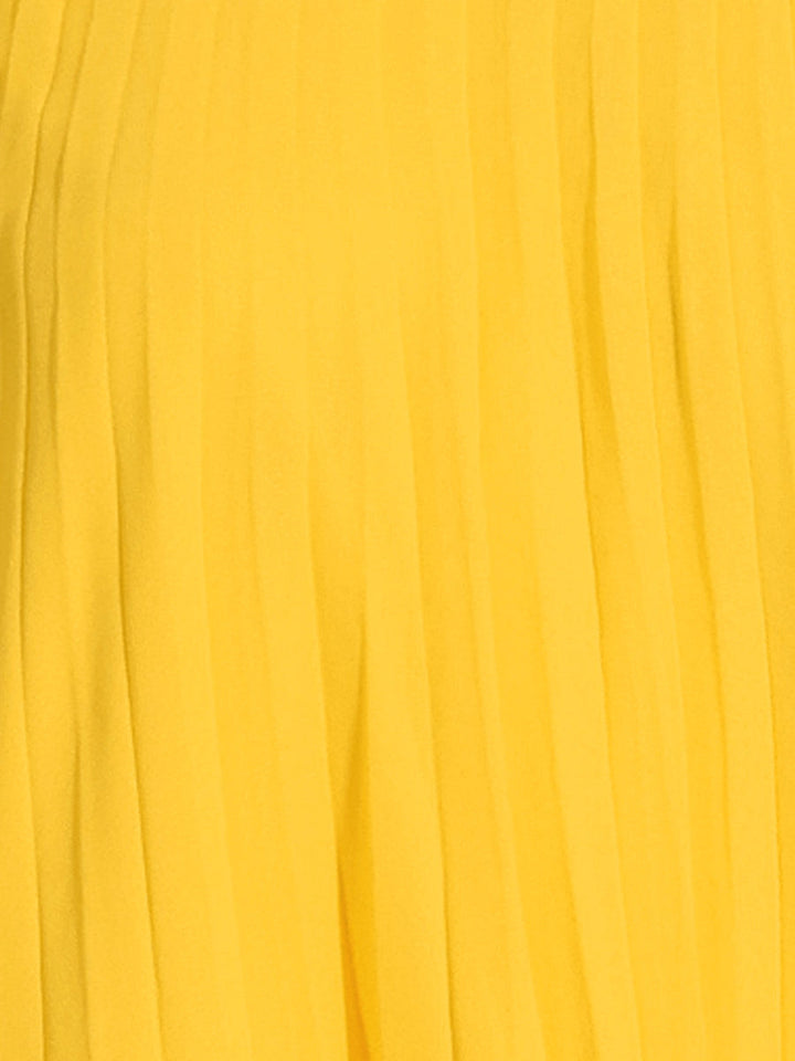 Elegant women's yellow mock neck swing dress, with graceful pleats & distinctive cape sleeves.