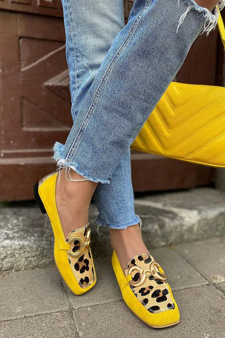 Comfortable women's yellow slip-on penny toe loafers, versatile footwear for fashion-forward casual & office styles.