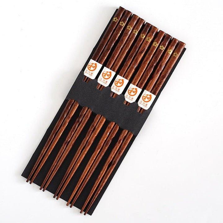 Reusable wooden chopsticks, 5 pairs, adorned with a stunning golden cherry blossom design for stylish Asian dining.