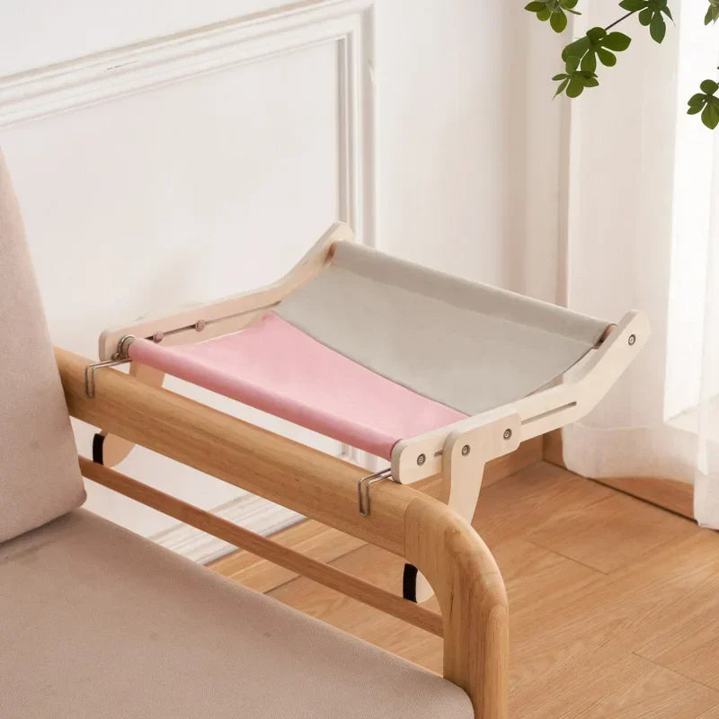 Cozy cat bed hammock, elevated wood frame perch, ideal for cats to relax & observe their surroundings.