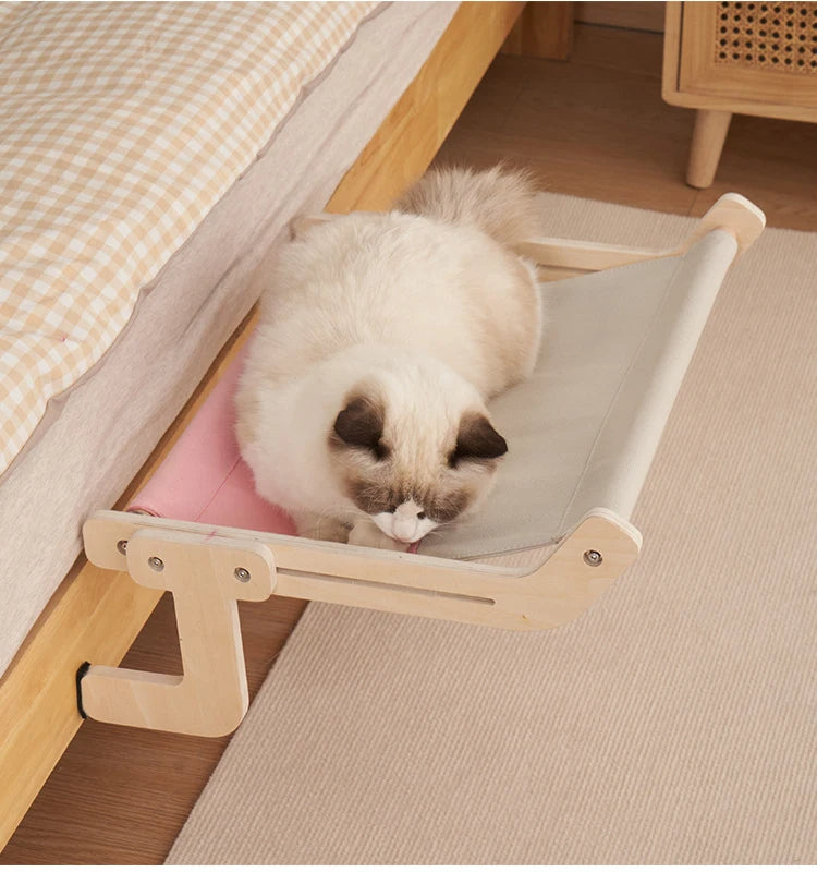 Modern pet furniture: Elevated cat hammock with a stylish wood frame & soft fabric for ultimate feline comfort.