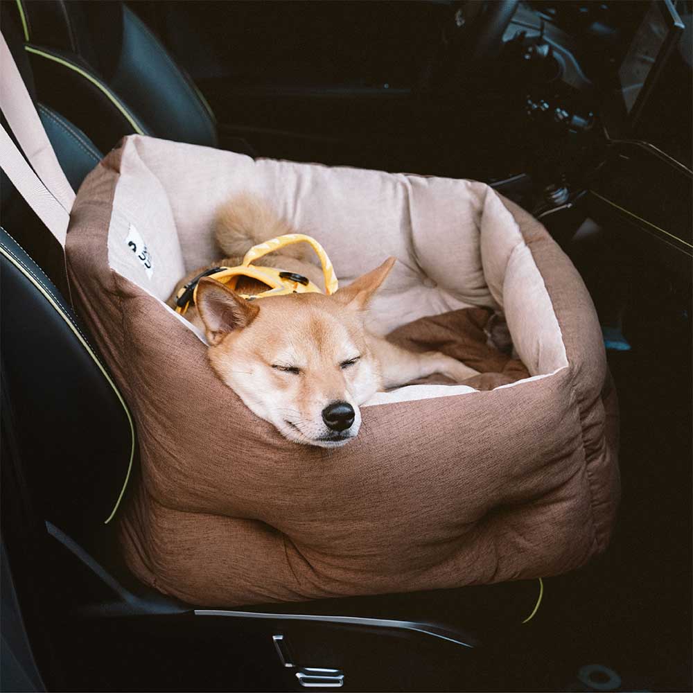 Dog car booster seat, black quilted, providing elevated comfort and a safe travel environment for pets.