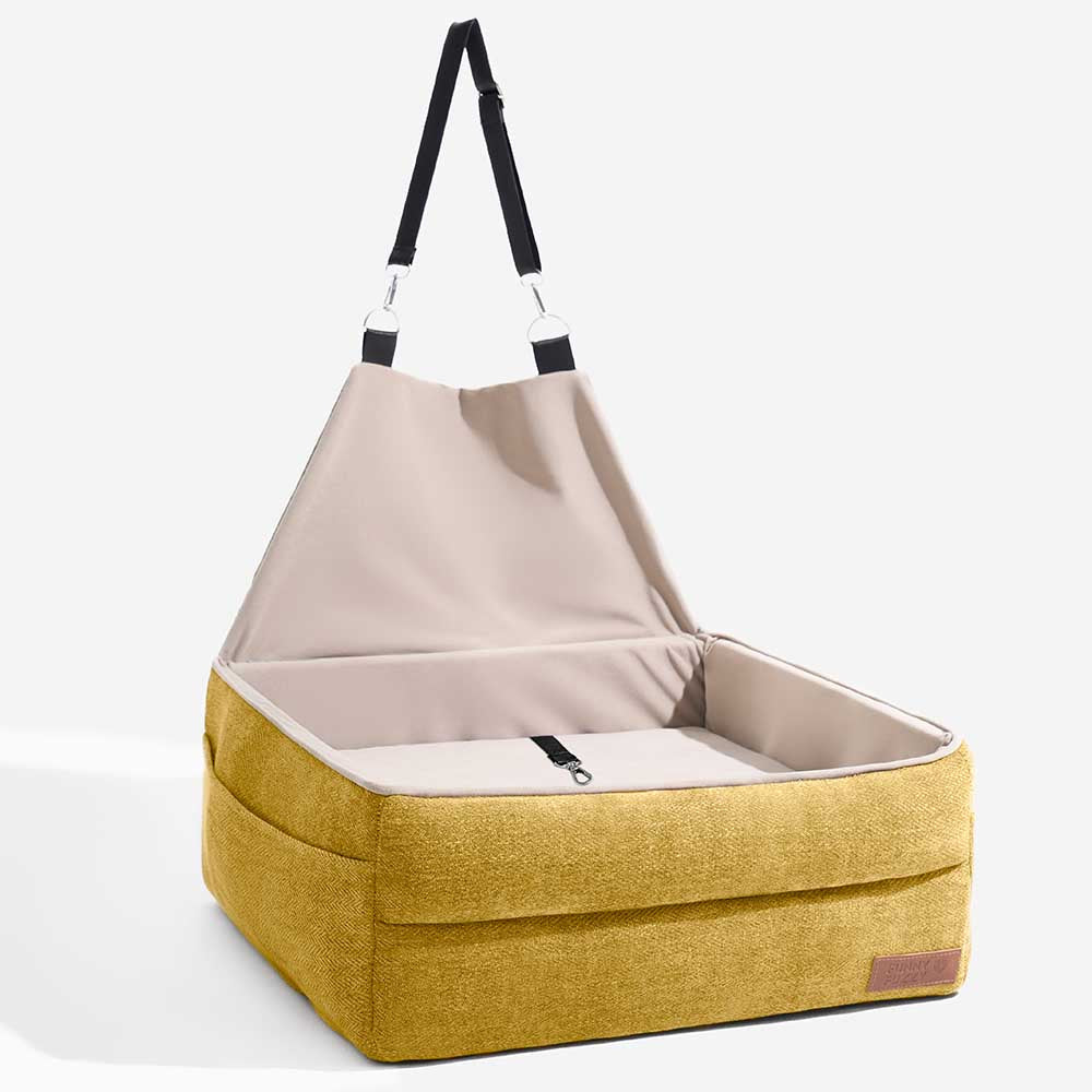 Durable dog car seat, elevated to protect pets during travel, with robust construction