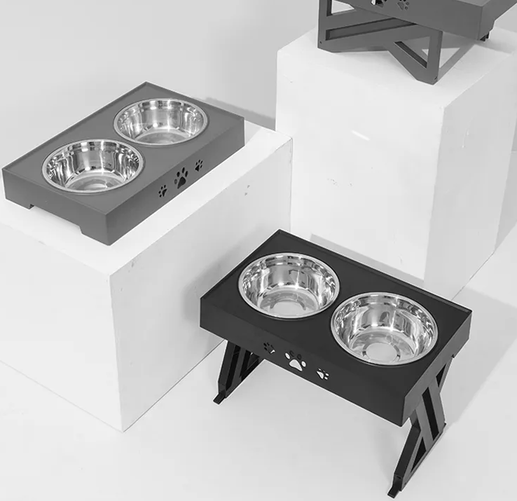 Unisex black elevated dog feeder with adjustable height, featuring easy-to-clean stainless steel pet food bowls.