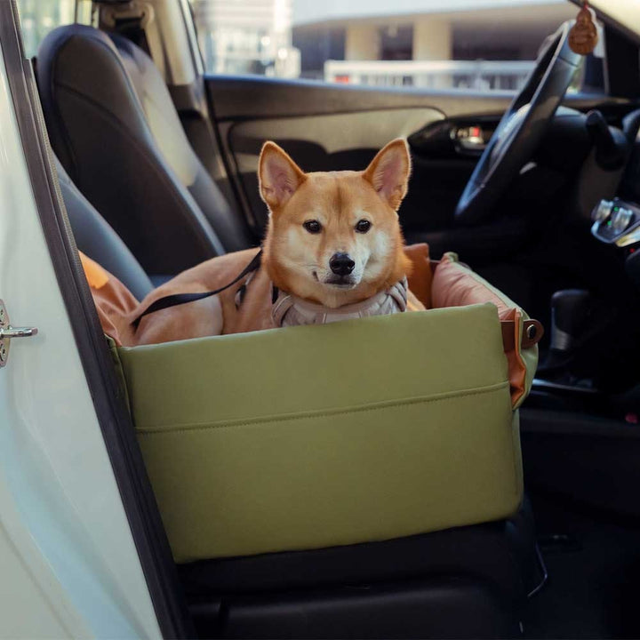 Close-up of waterproof faux leather texture on an elevated dog car seat booster bed.