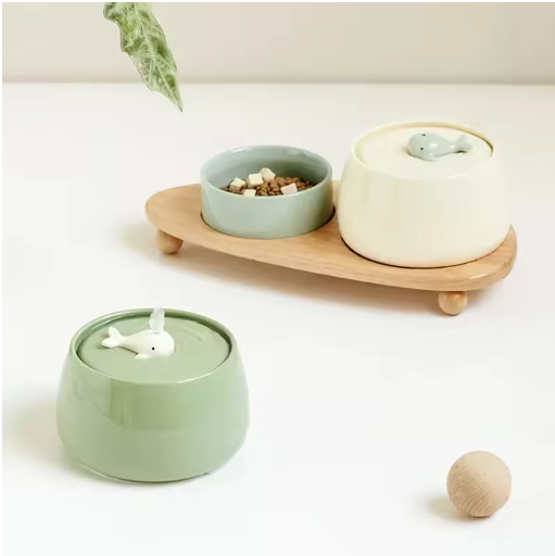 Close-up of a ceramic pet bowl nestled in a wooden stand, highlighting the easy-clean design.