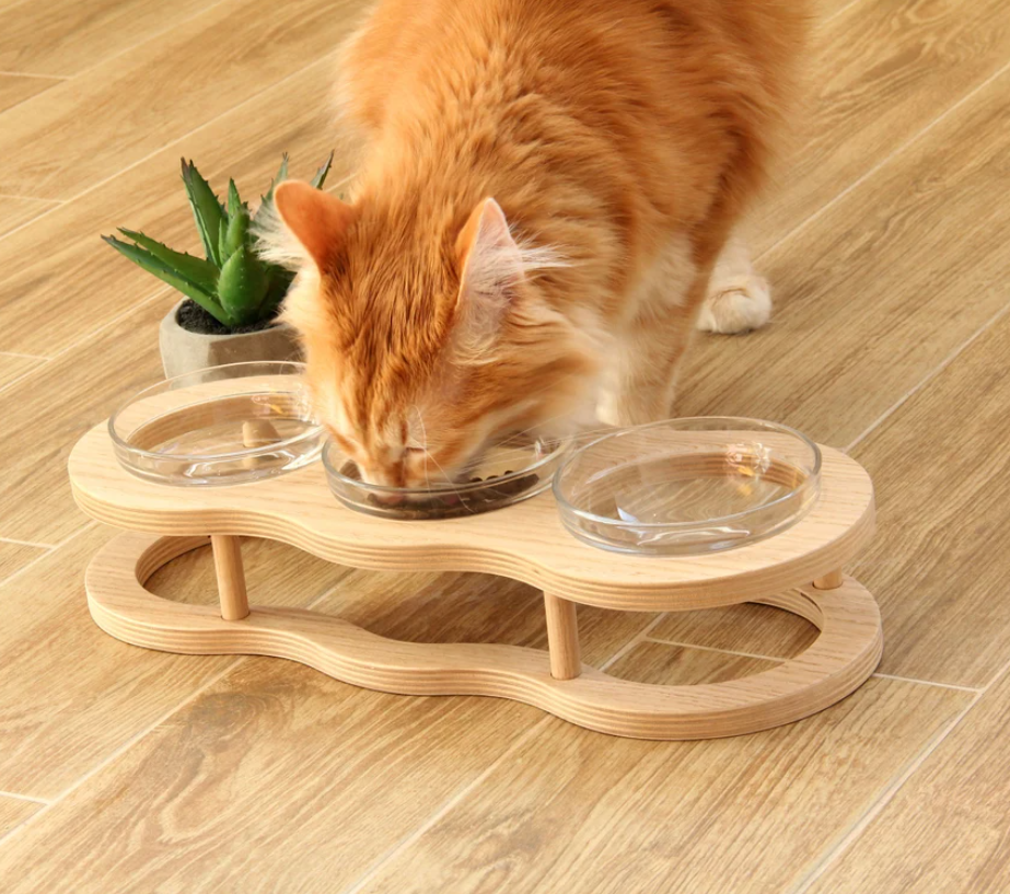 Elevated pet food bowl set with two glass bowls and wooden stand, non-slip base for dogs and cats